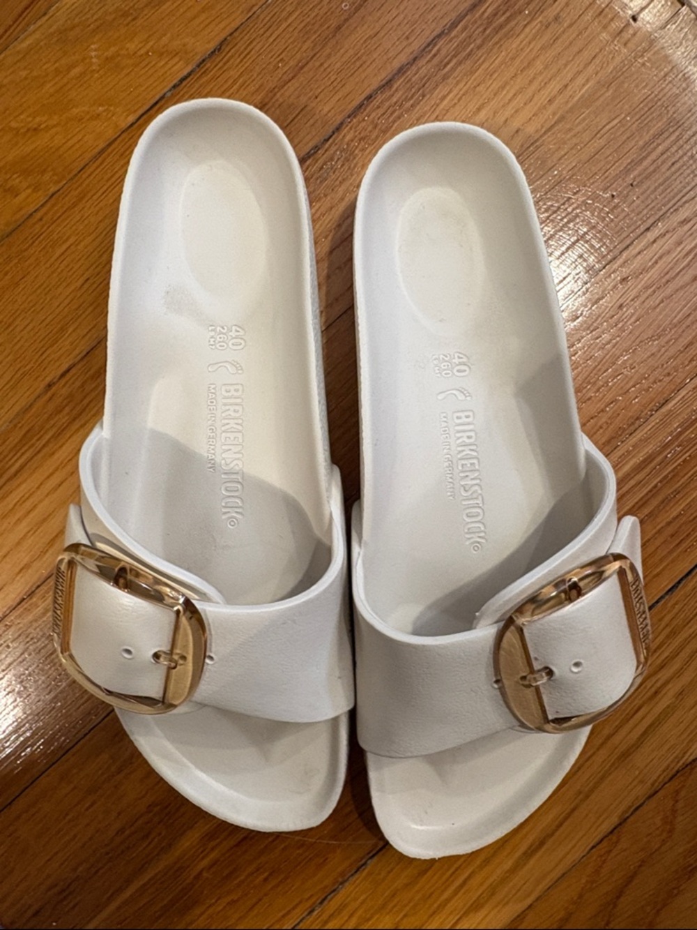 Birkenstock White EVA Slide with Gold Buckle Accent